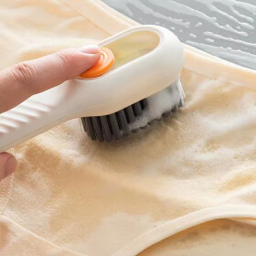 Reinigungsb&uuml;rste mit integriertem Fl&uuml;ssigkeitsspender, weiss